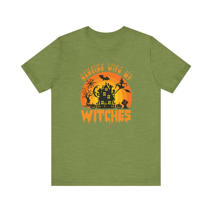 Witches and Haunted House Shirt,  Spooky Halloween Season Graphic Tee, Sunset Halloween Design, Creepy Fall or Autumn Style T Shirt, T-Shirt Printify Heather Green XS 